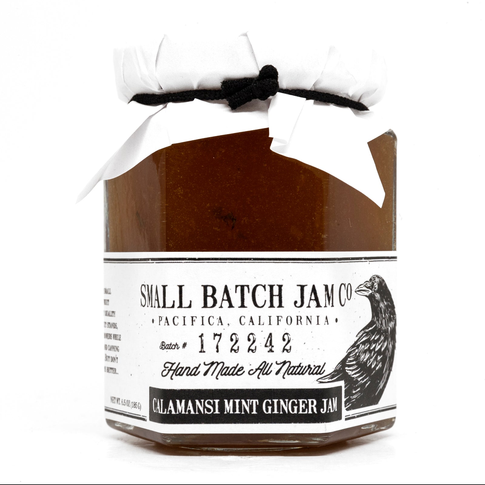 Jar of Small Batch Jam Co. Calamansi Mint Ginger Jam with a white label.